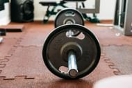 Barbell floor press. (Image credits: Freepik)